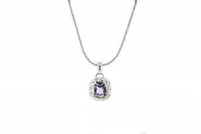 Italian sterling silver pendant with amethyst center stone and solid 14K yellow gold accents.  The chain is included