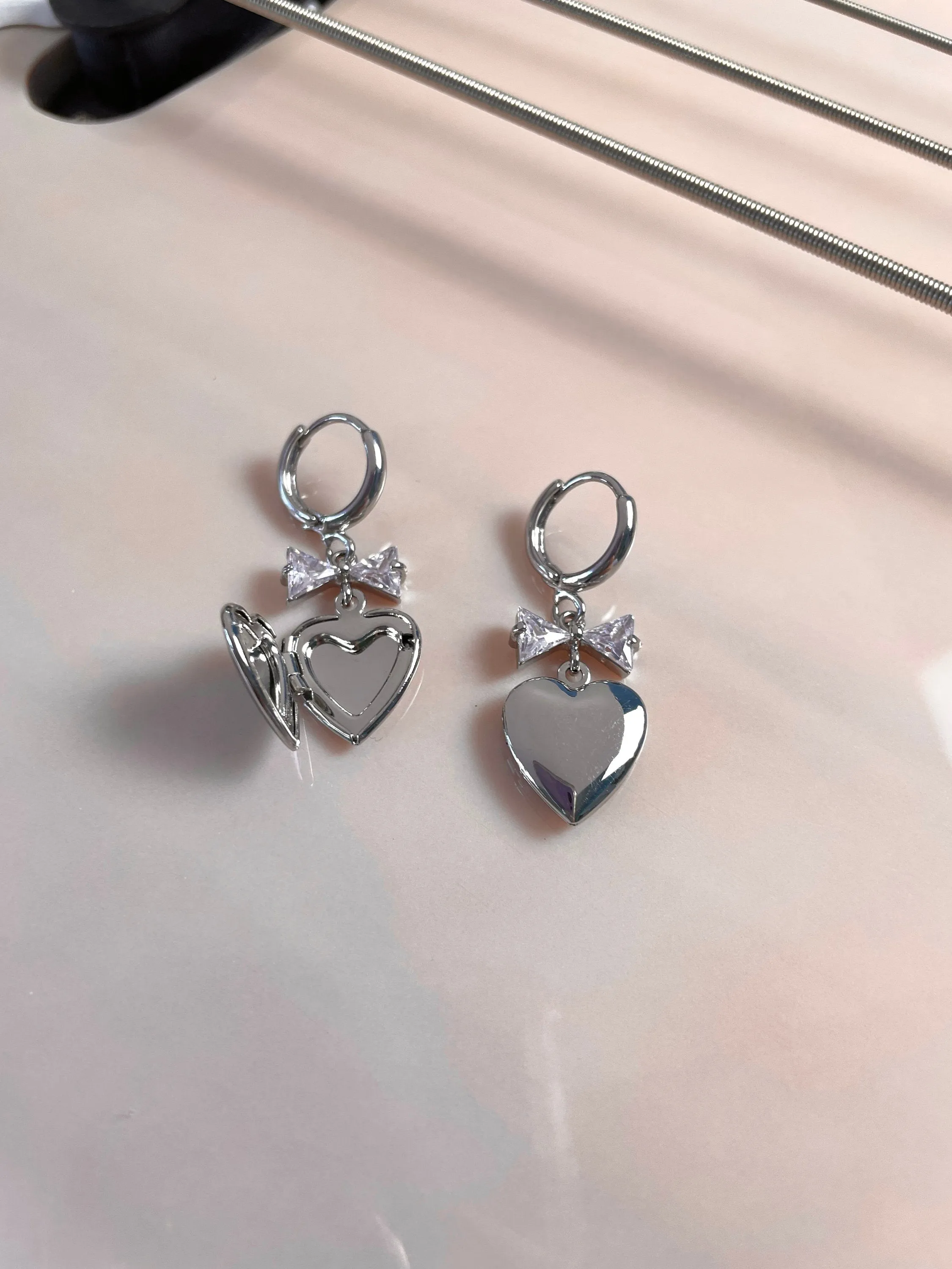 Meri Heart Locket Bow Earrings