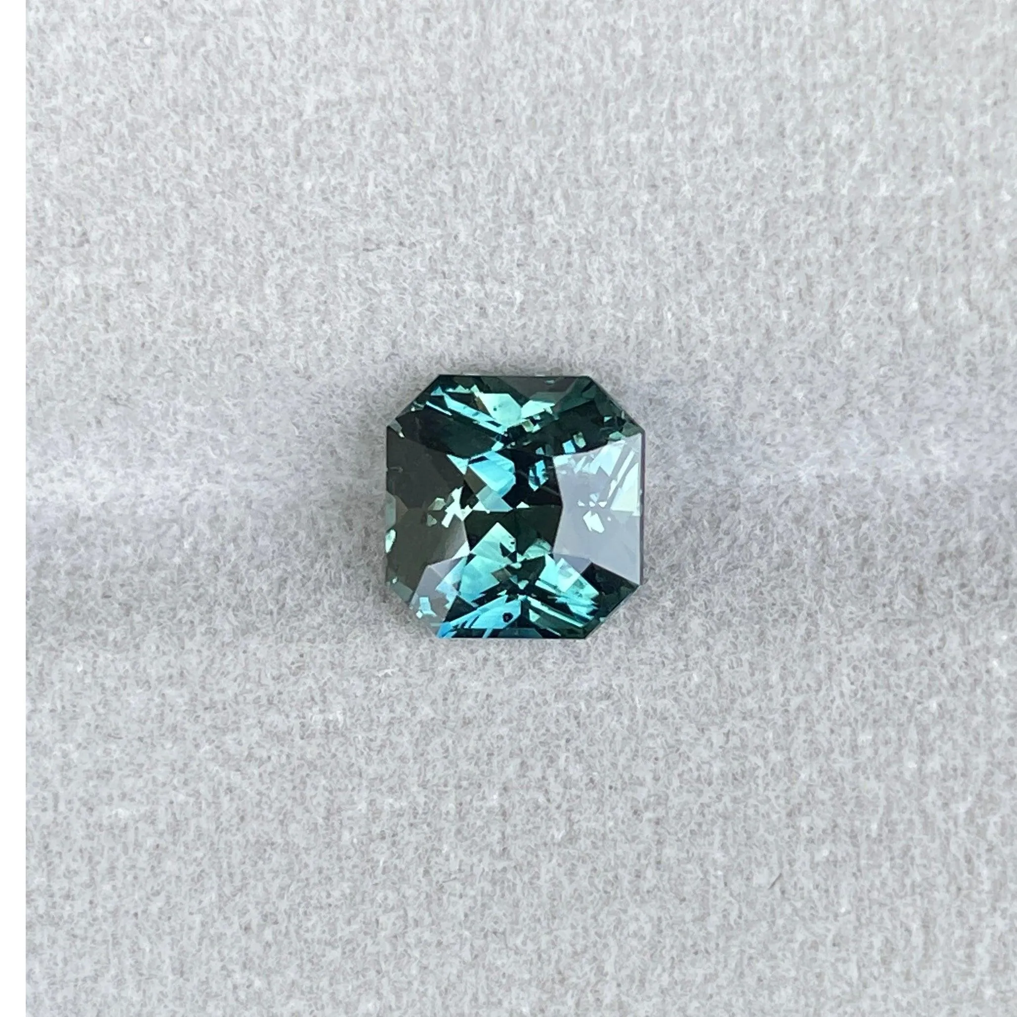 This 3.35 carat Teal Sapphire is well cut to bring out the best colour and luster, 8.20mm x 8.30mm x 5.50mm