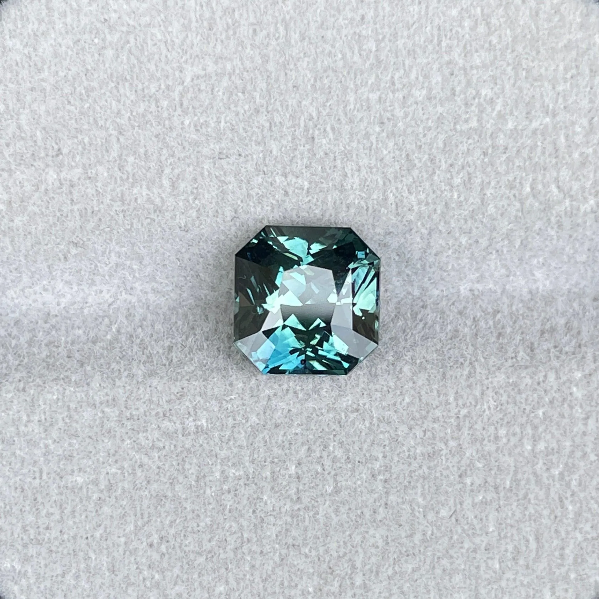 This 3.35 carat Teal Sapphire is well cut to bring out the best colour and luster, 8.20mm x 8.30mm x 5.50mm