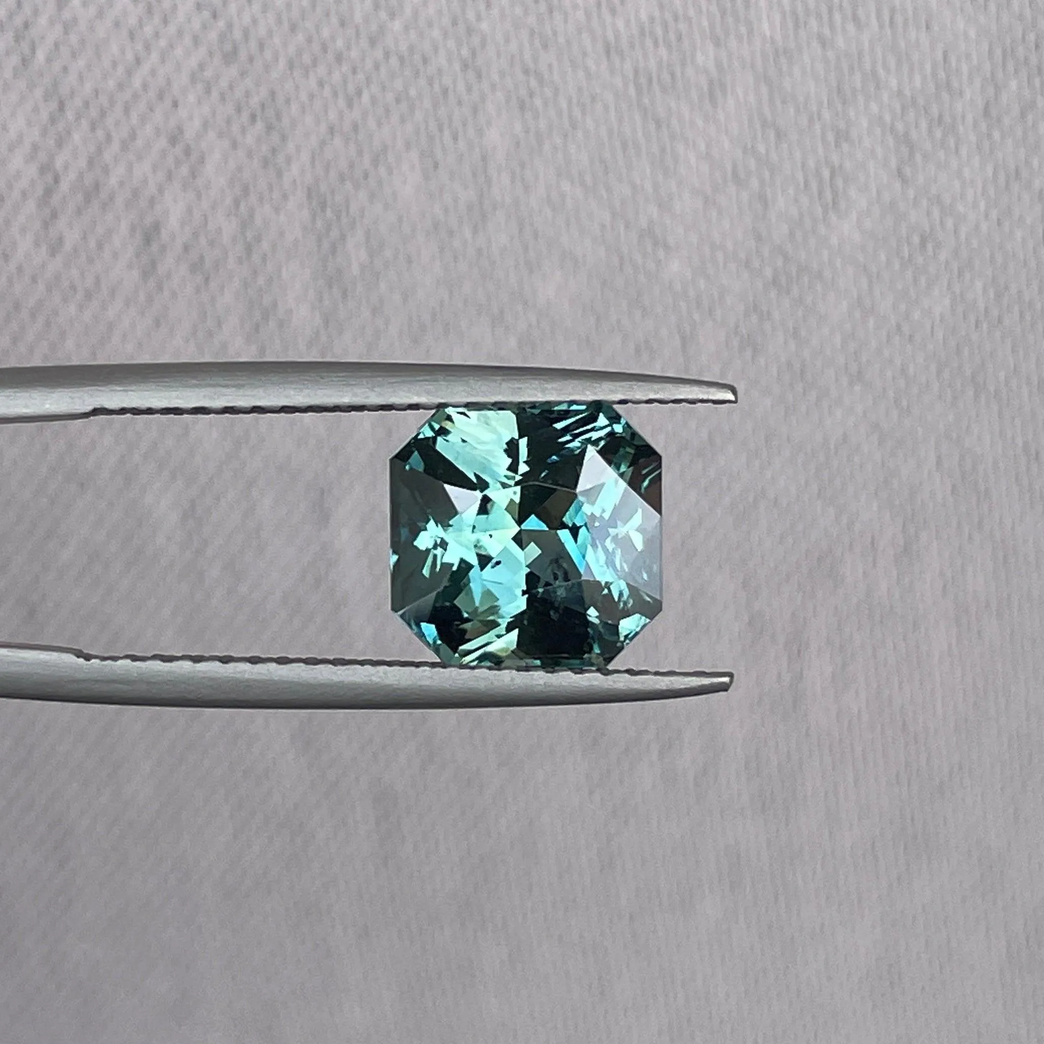 This 3.35 carat Teal Sapphire is well cut to bring out the best colour and luster, 8.20mm x 8.30mm x 5.50mm