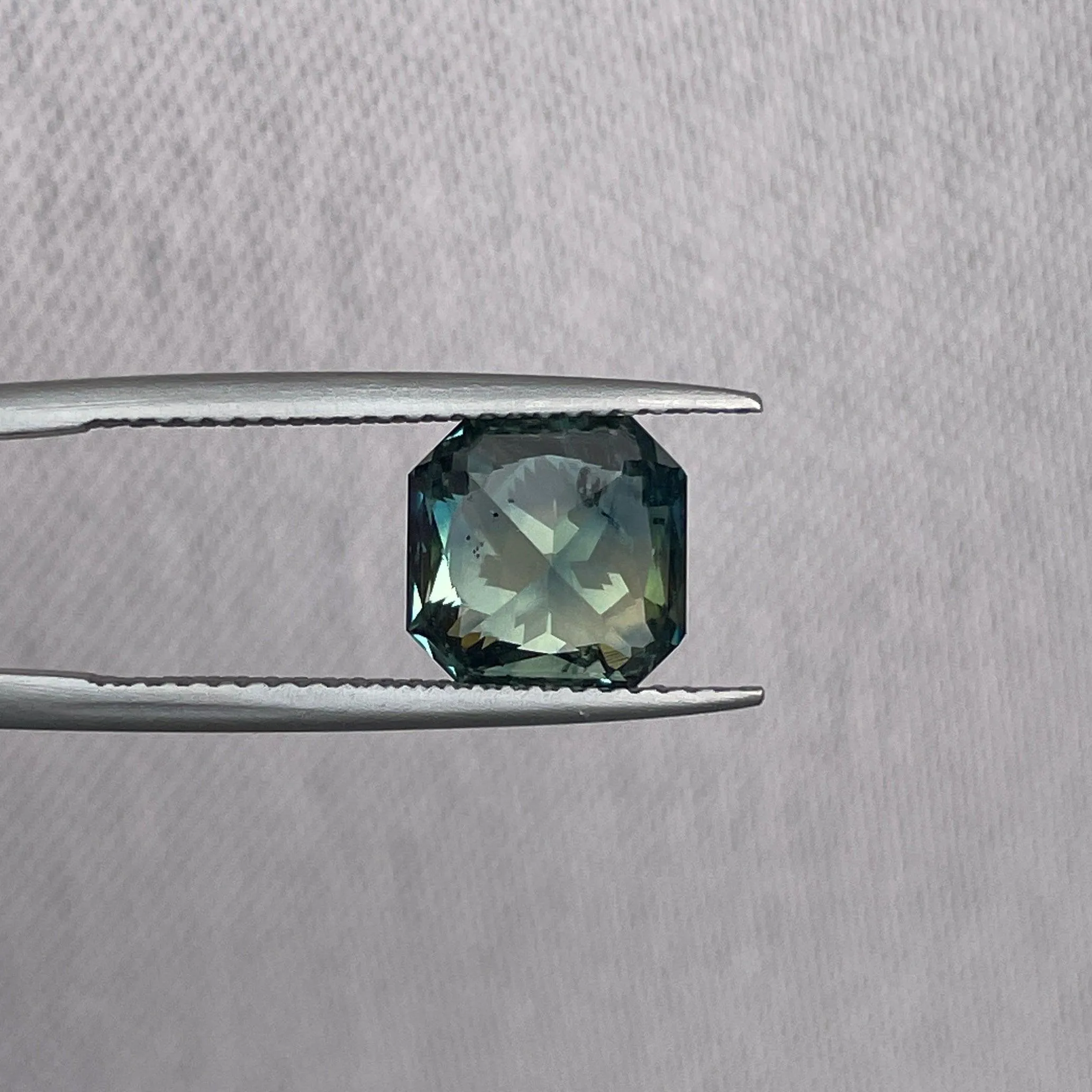 This 3.35 carat Teal Sapphire is well cut to bring out the best colour and luster, 8.20mm x 8.30mm x 5.50mm