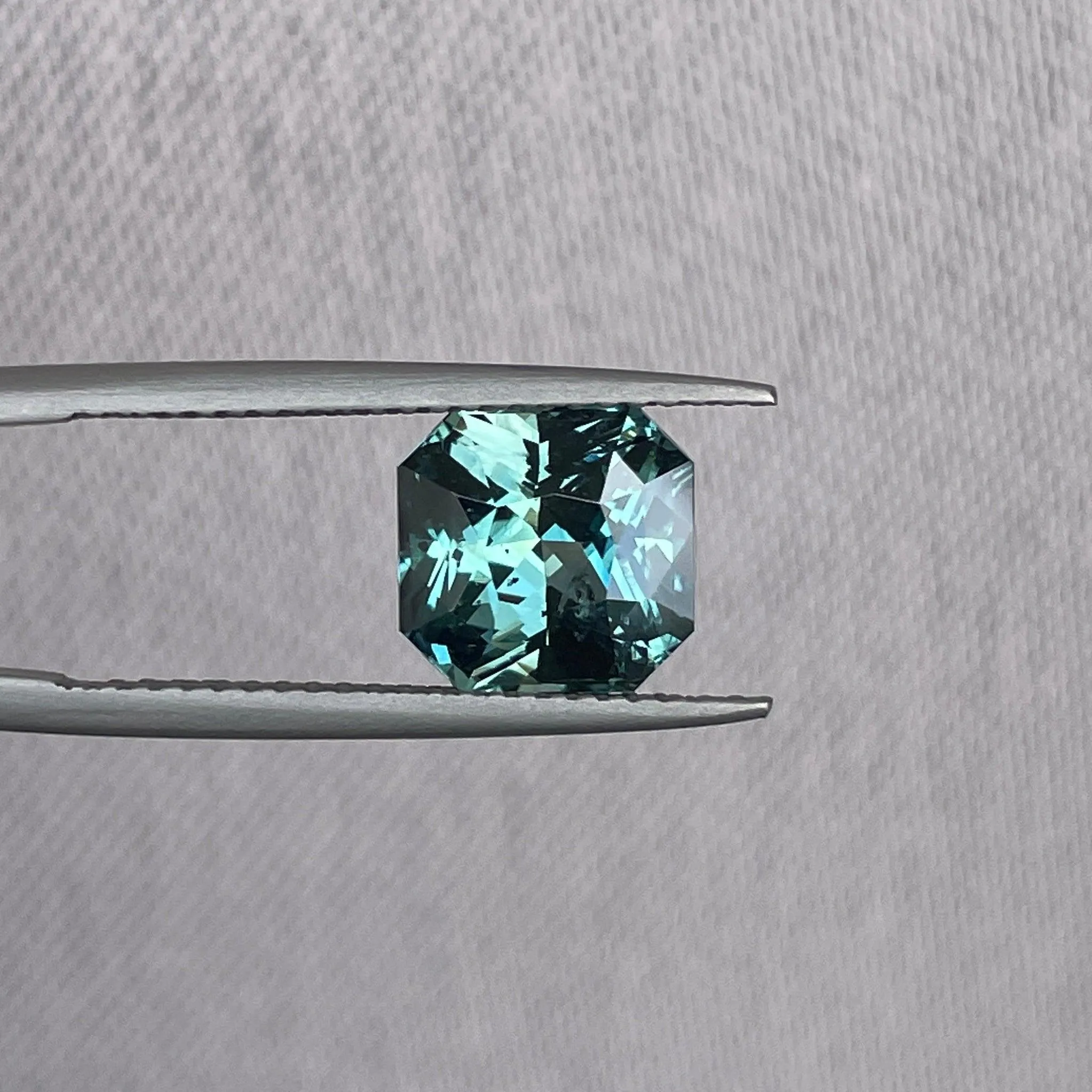 This 3.35 carat Teal Sapphire is well cut to bring out the best colour and luster, 8.20mm x 8.30mm x 5.50mm