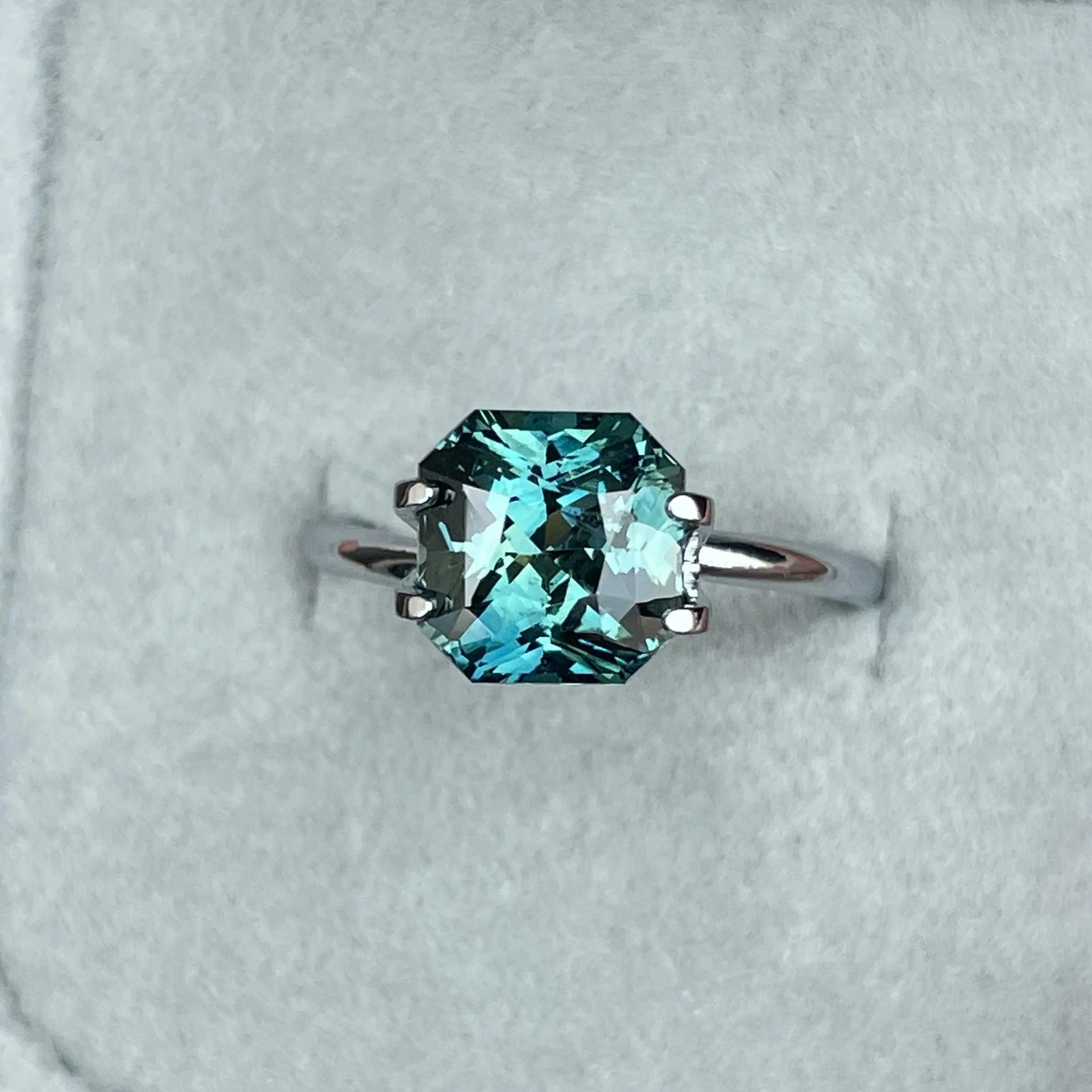 This 3.35 carat Teal Sapphire is well cut to bring out the best colour and luster, 8.20mm x 8.30mm x 5.50mm