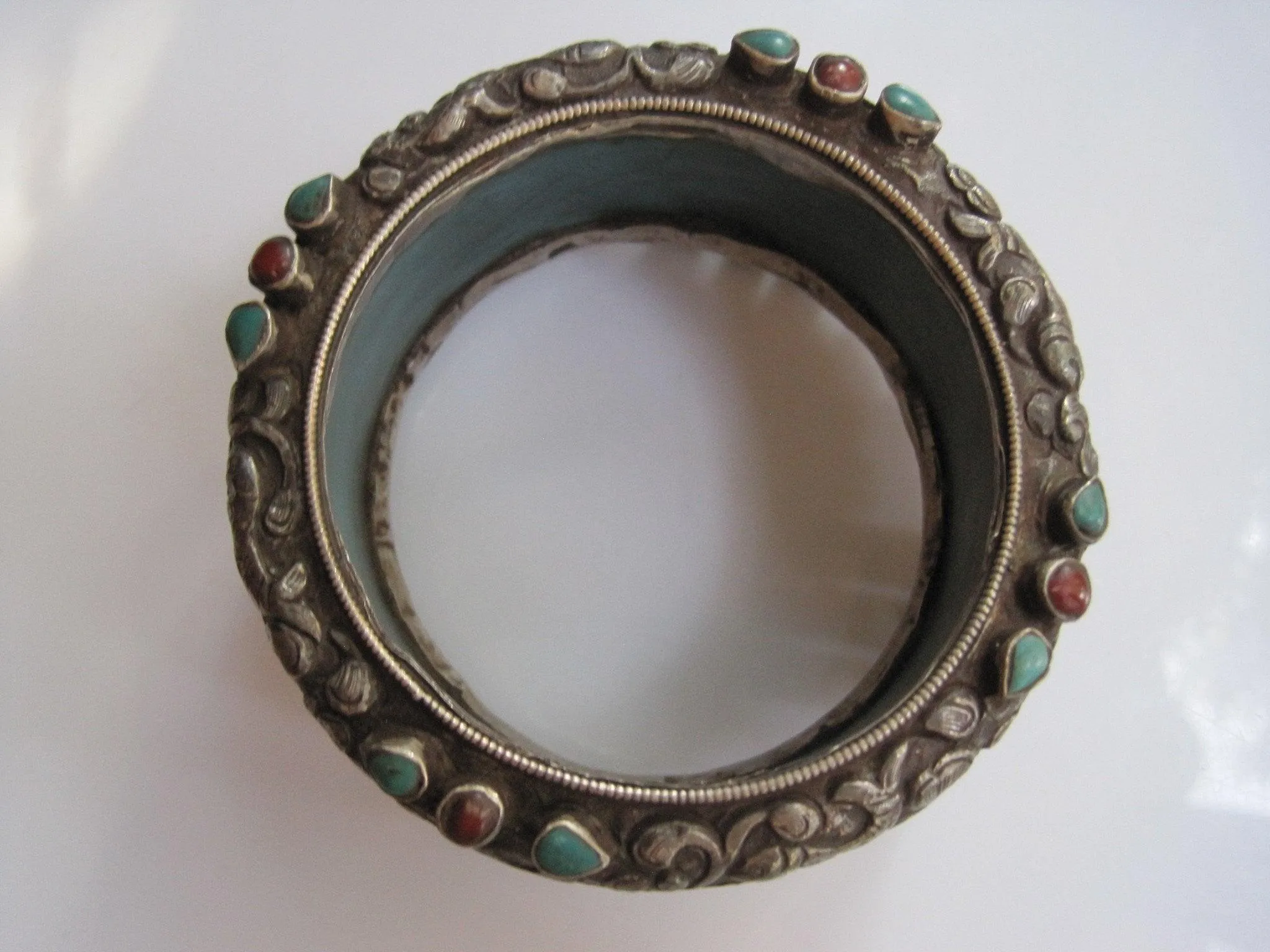 Vintage Carved Animal Blue Resin Bracelet from Nepal or Tibet with Silver Overlay